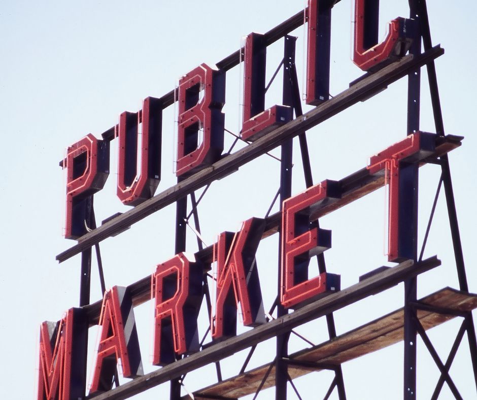 public market sign in Seattle: Top 5 Must-See Attractions in Seattle for Business Travelers