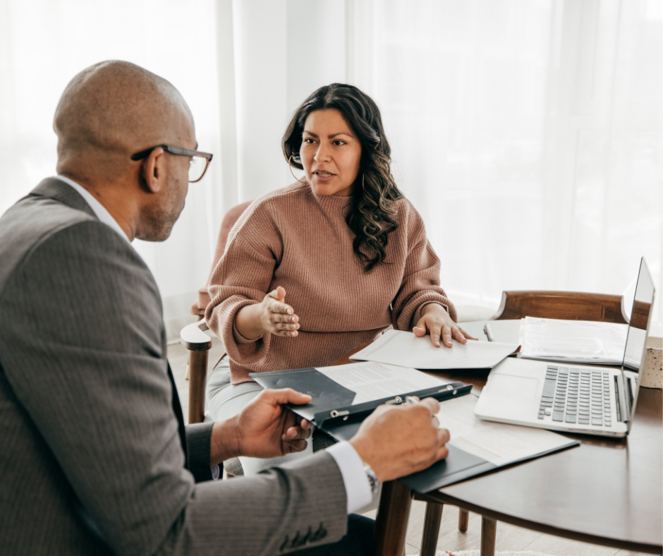 client and insurance adjustor having a meeting about a home insurance claim