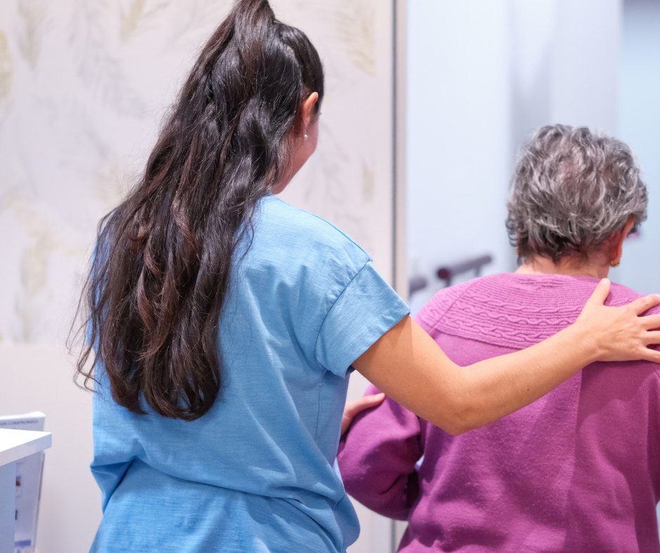 travel nurse helping a patient in redmond washington